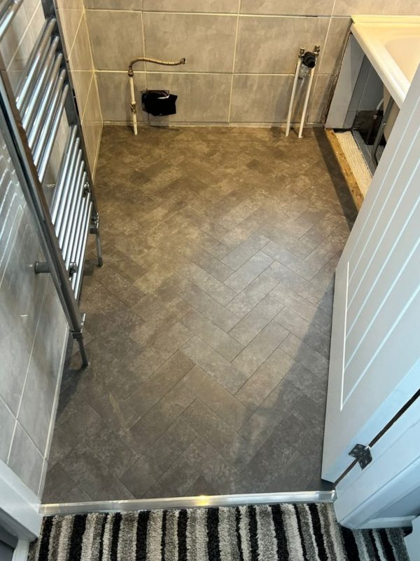 Amtico Spacia in the colour Horizon in parquet design.