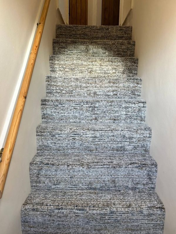 Fells carpet in Runswick Bay Evolution. Made from 100% recycled yarn, with an average of 120 plastic bottles per square meter. This eco friendly choice doesn't just look good, it does good.